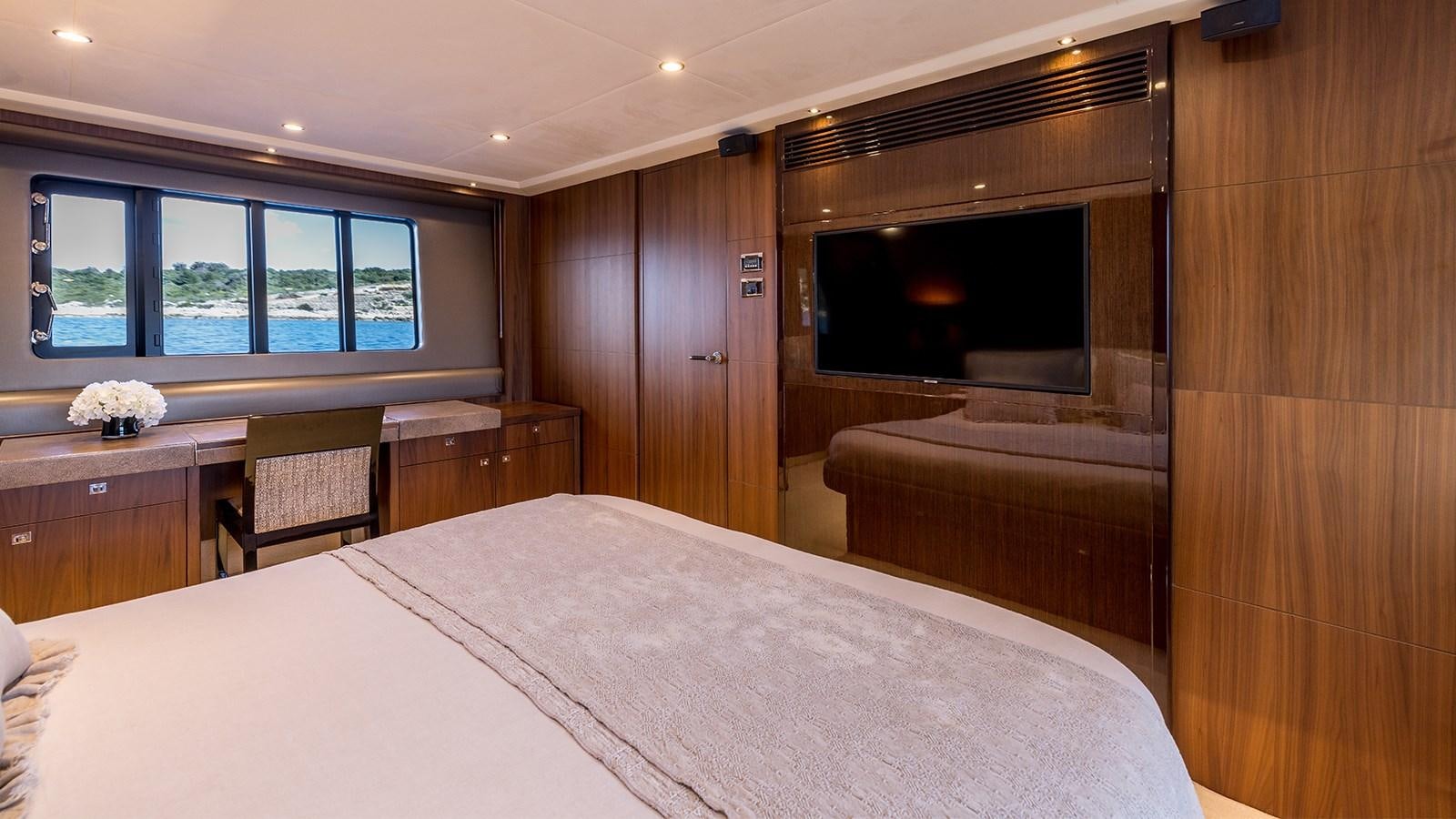 a bed in a room aboard SEA DREAM II Yacht for Sale
