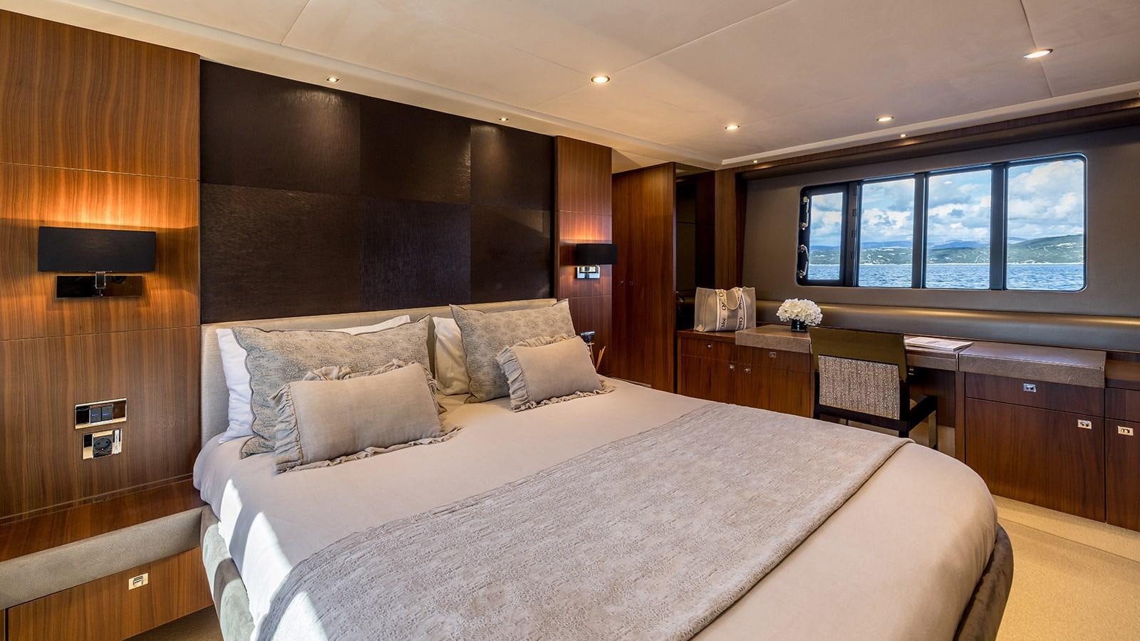 a large bed in a hotel room aboard SEA DREAM II Yacht for Sale
