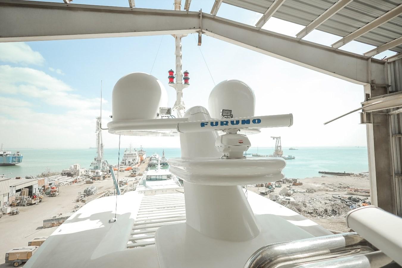 a white boat on a body of water aboard 2008 OCEANDRO 48M CUSTOM Yacht for Sale