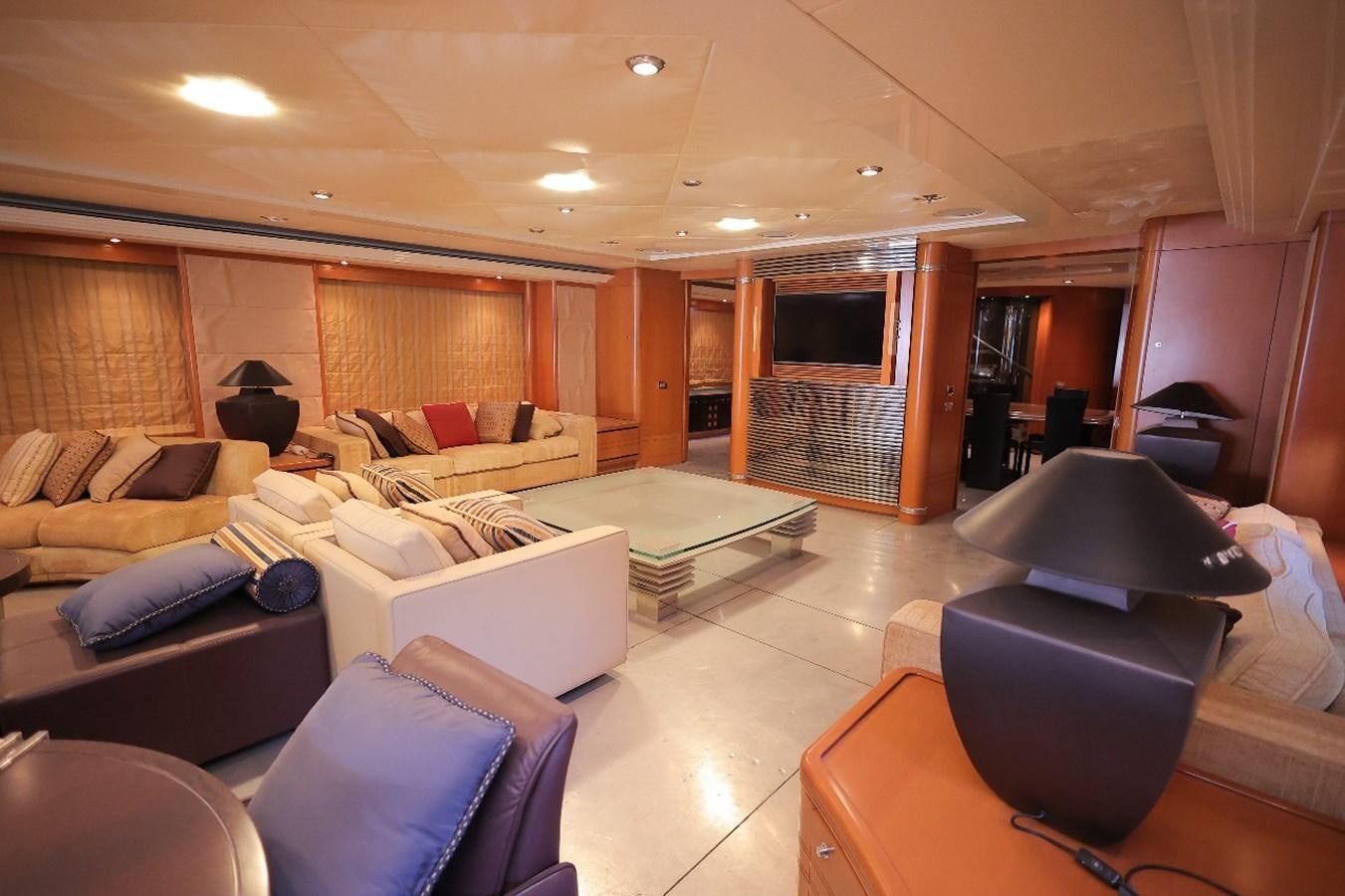 a living room with a large fireplace aboard 2008 OCEANDRO 48M CUSTOM Yacht for Sale