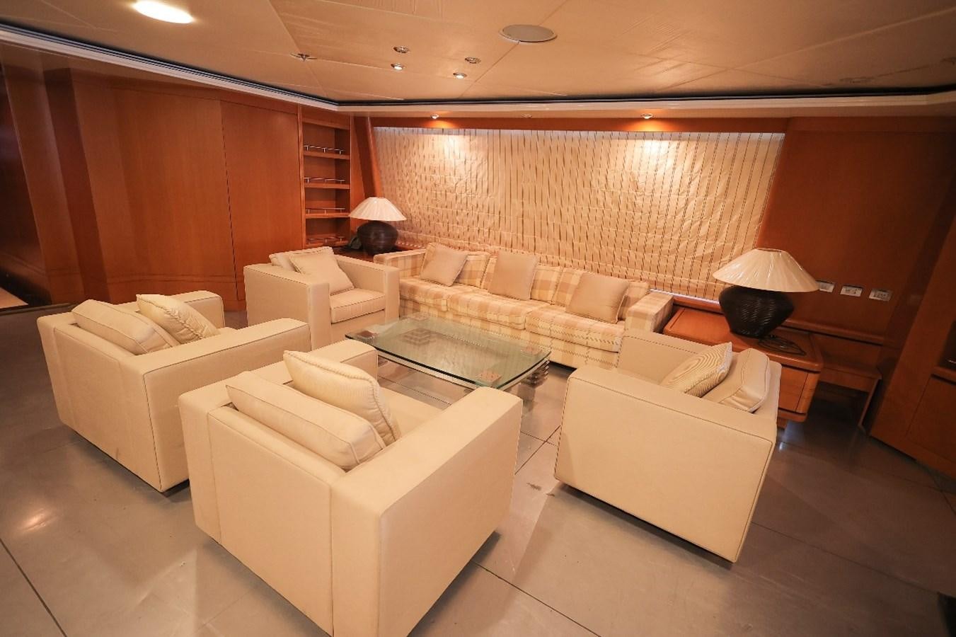 a living room with a couch and a table aboard 2008 OCEANDRO 48M CUSTOM Yacht for Sale
