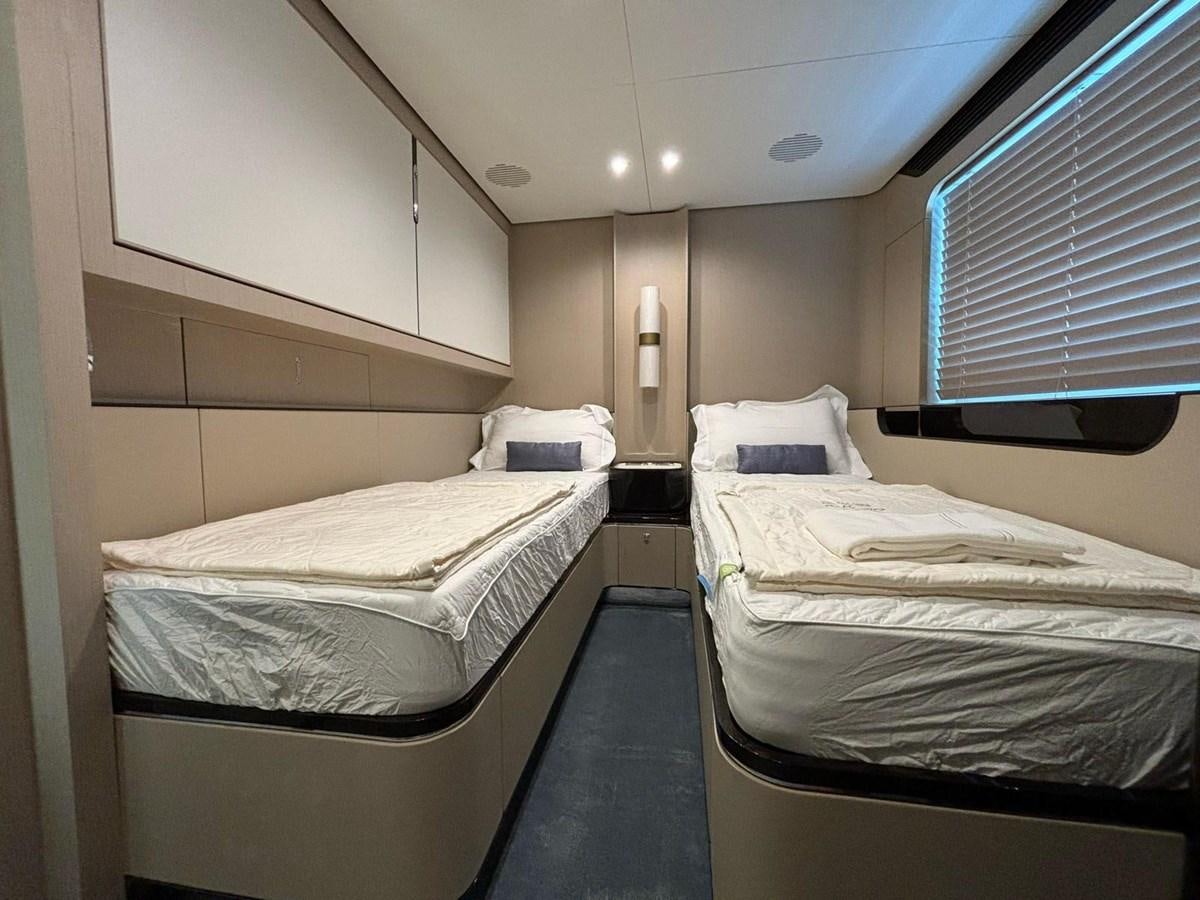 a room with two beds aboard LONG TENG Yacht for Sale