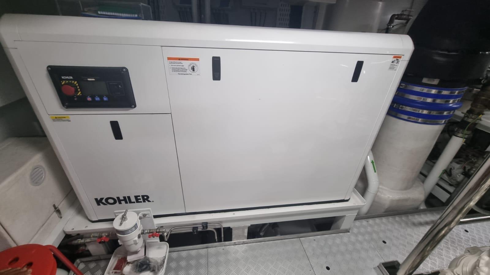 a white machine with a black screen aboard LONG TENG Yacht for Sale