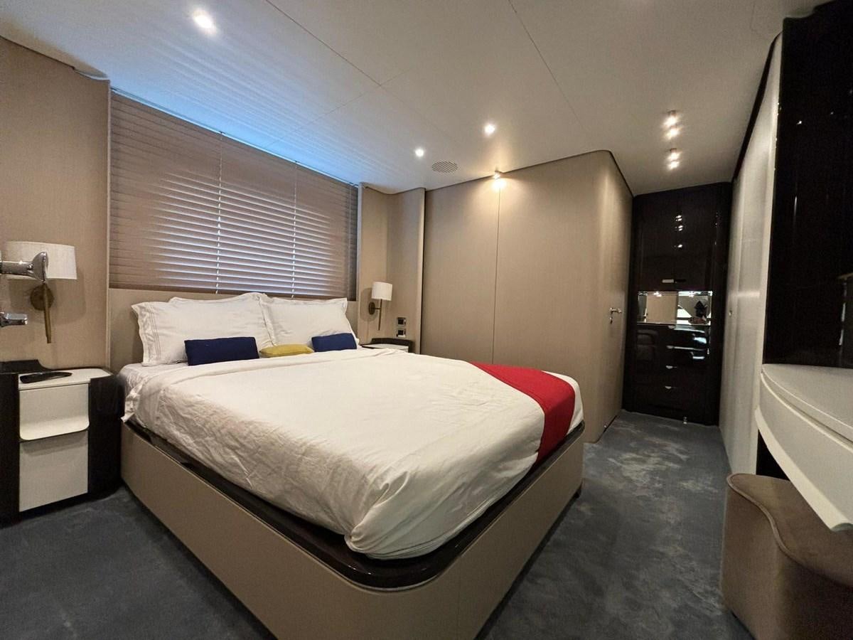 a bed in a room aboard LONG TENG Yacht for Sale