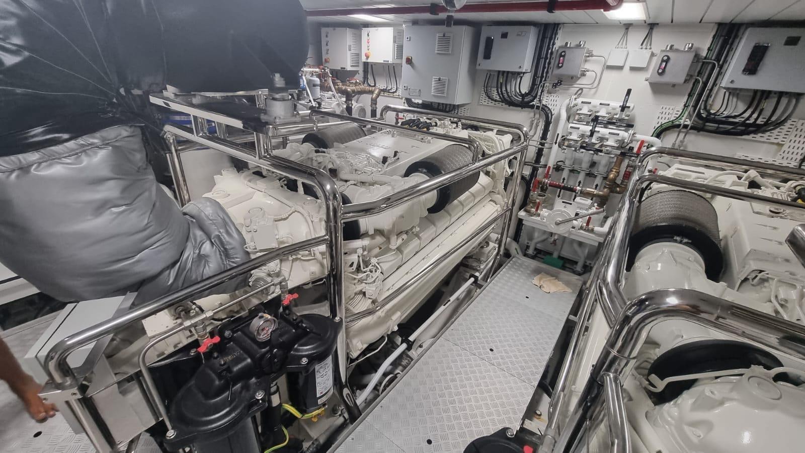 a room with a large group of machines aboard LONG TENG Yacht for Sale