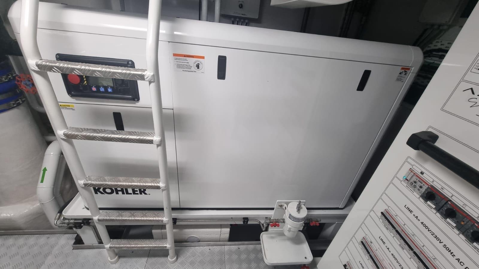 a white machine with a white panel aboard LONG TENG Yacht for Sale