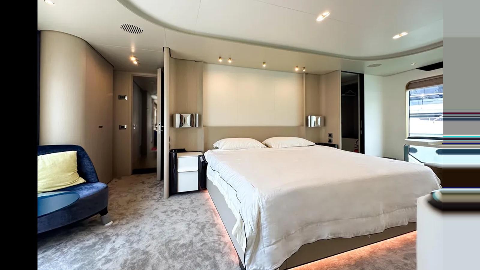 a large bedroom with a bed aboard LONG TENG Yacht for Sale