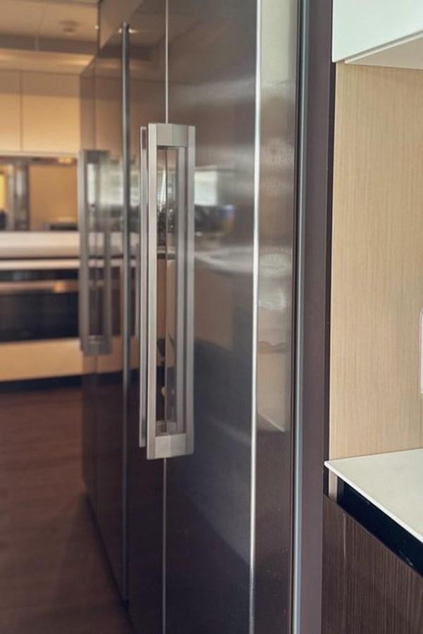 a large glass cabinet aboard LONG TENG Yacht for Sale