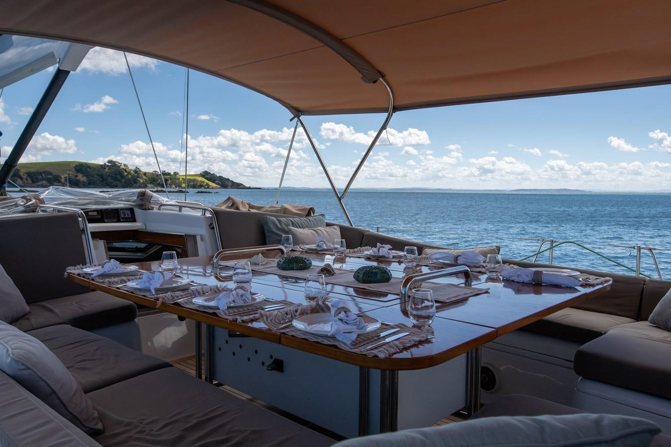 a table set for a dinner aboard CRAZY HORSE Yacht for Sale