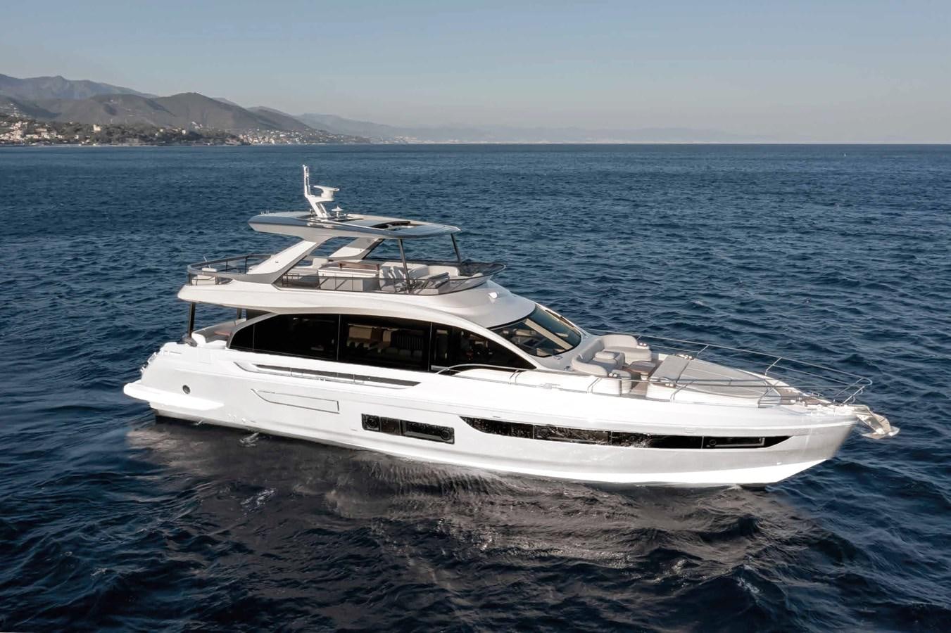 a white yacht on the water aboard AZIMUT 72 Yacht for Sale