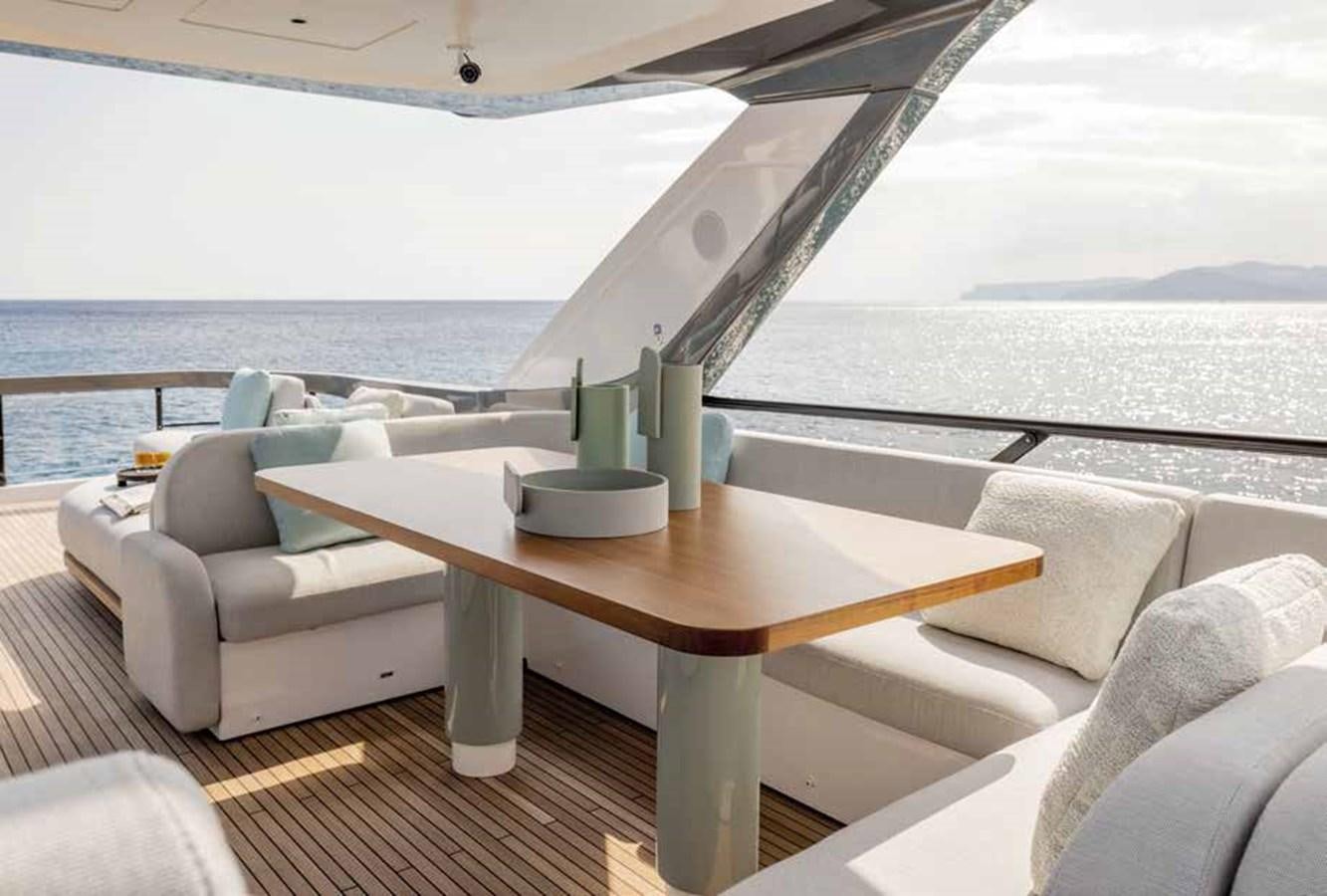 a table on a boat aboard AZIMUT 72 Yacht for Sale
