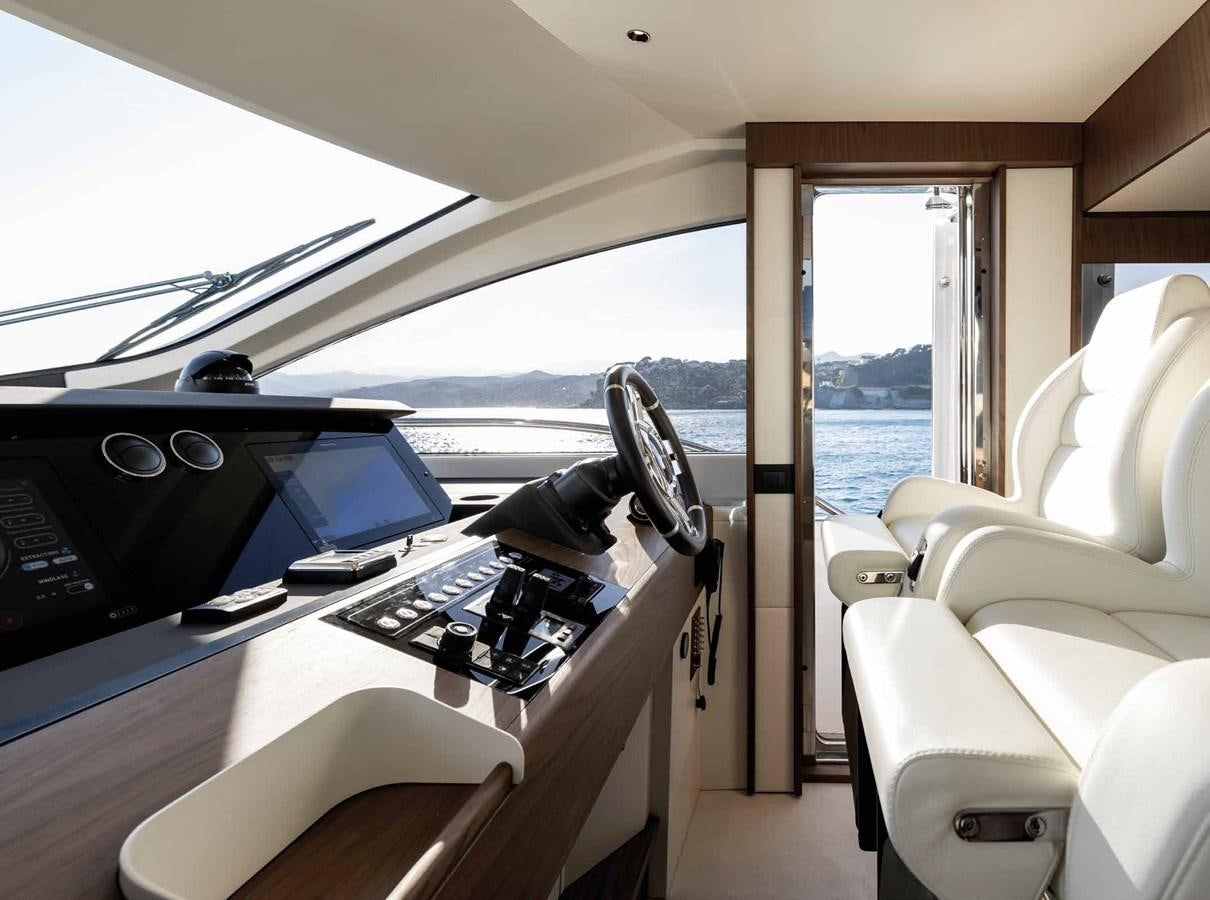 a boat with a keyboard and monitor aboard AZIMUT 72 Yacht for Sale