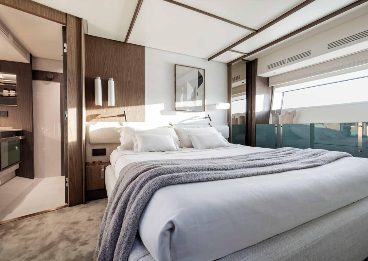 a bed in a room aboard AZIMUT 72 Yacht for Sale