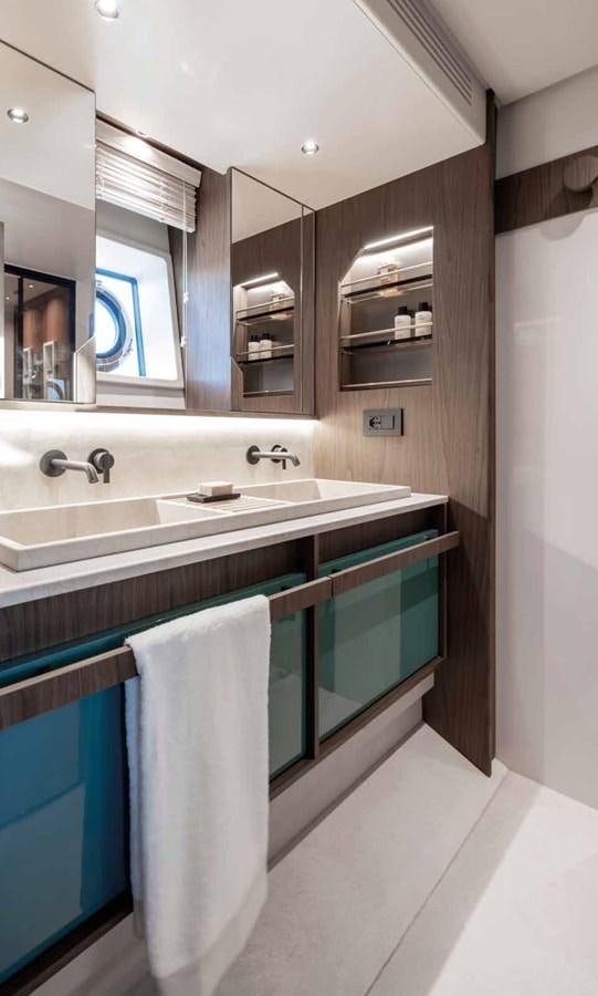 a bathroom with a large countertop aboard AZIMUT 72 Yacht for Sale