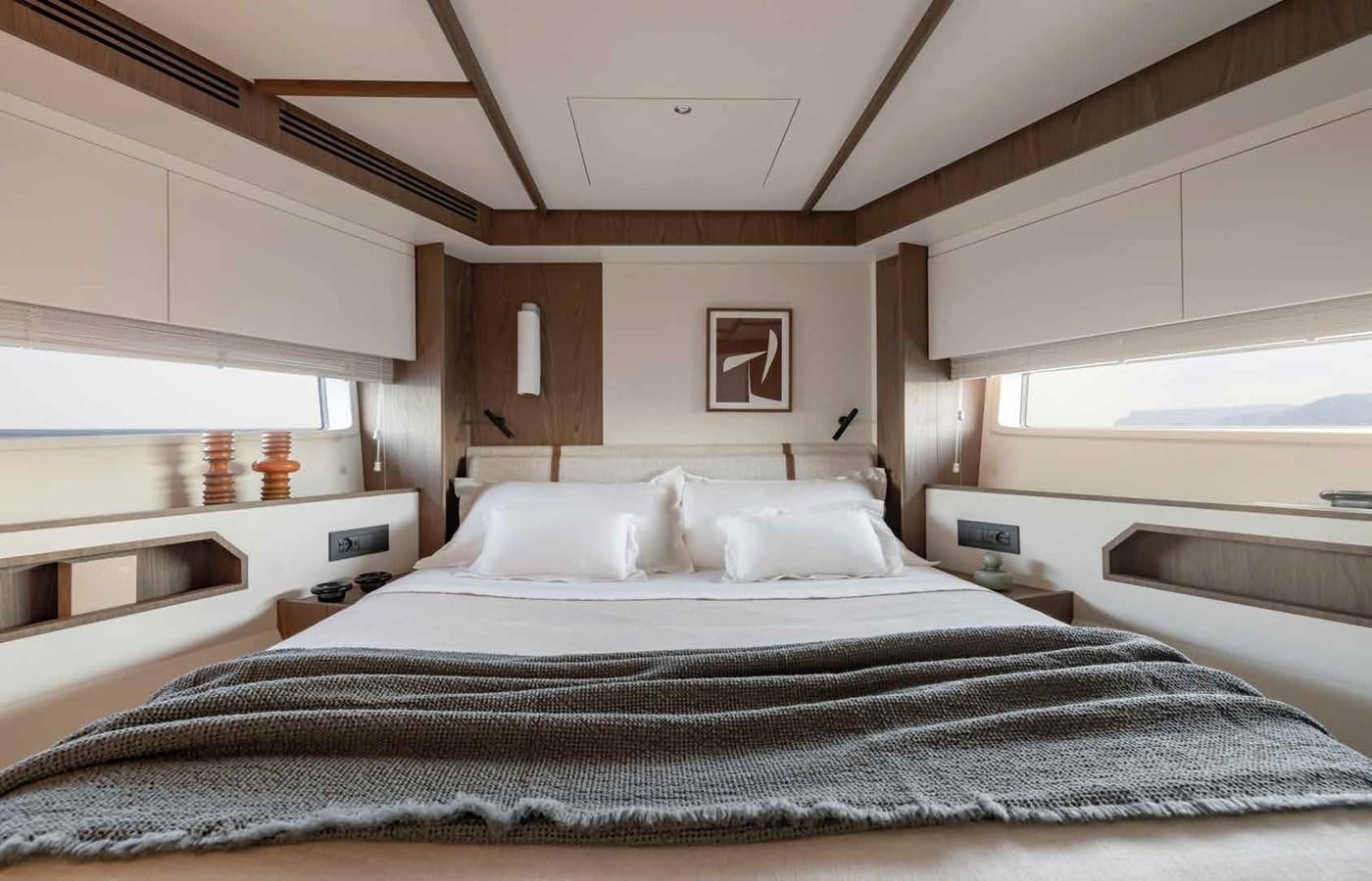 a room with a bed and a desk aboard AZIMUT 72 Yacht for Sale