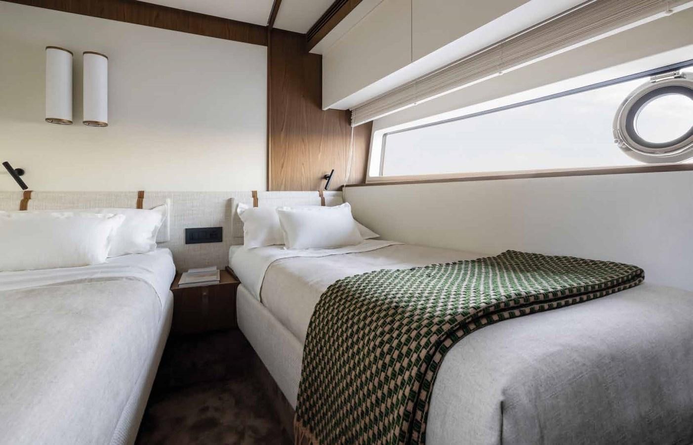 a couple of beds in a room aboard AZIMUT 72 Yacht for Sale