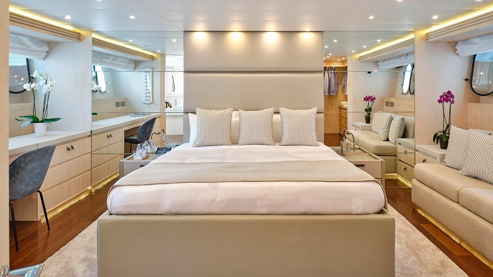 a large bed in a room aboard WHITE KNIGHT Yacht for Sale
