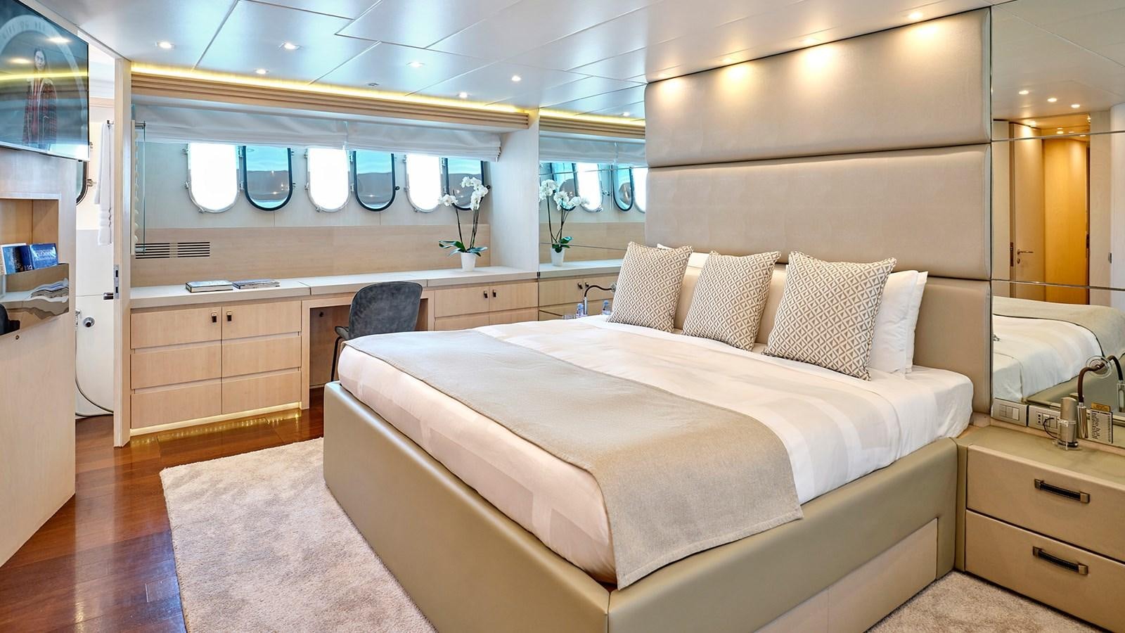 a large bedroom with a large bed aboard WHITE KNIGHT Yacht for Sale