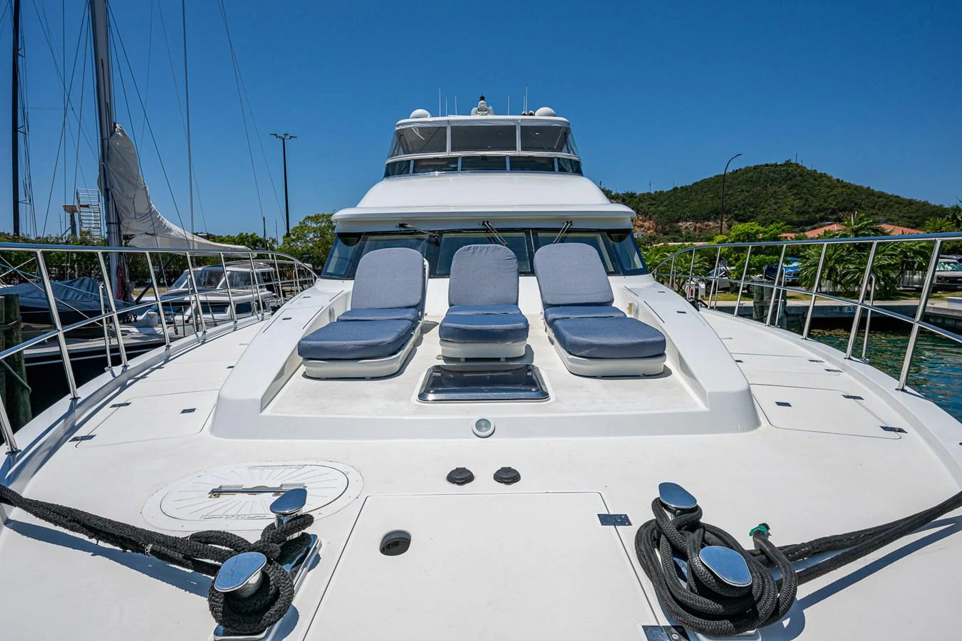a white yacht with a blue roof aboard LADY LORRAINE Yacht for Sale