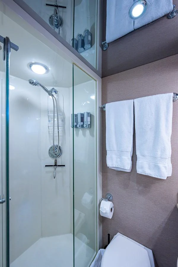 a shower with a glass door aboard LADY LORRAINE Yacht for Sale