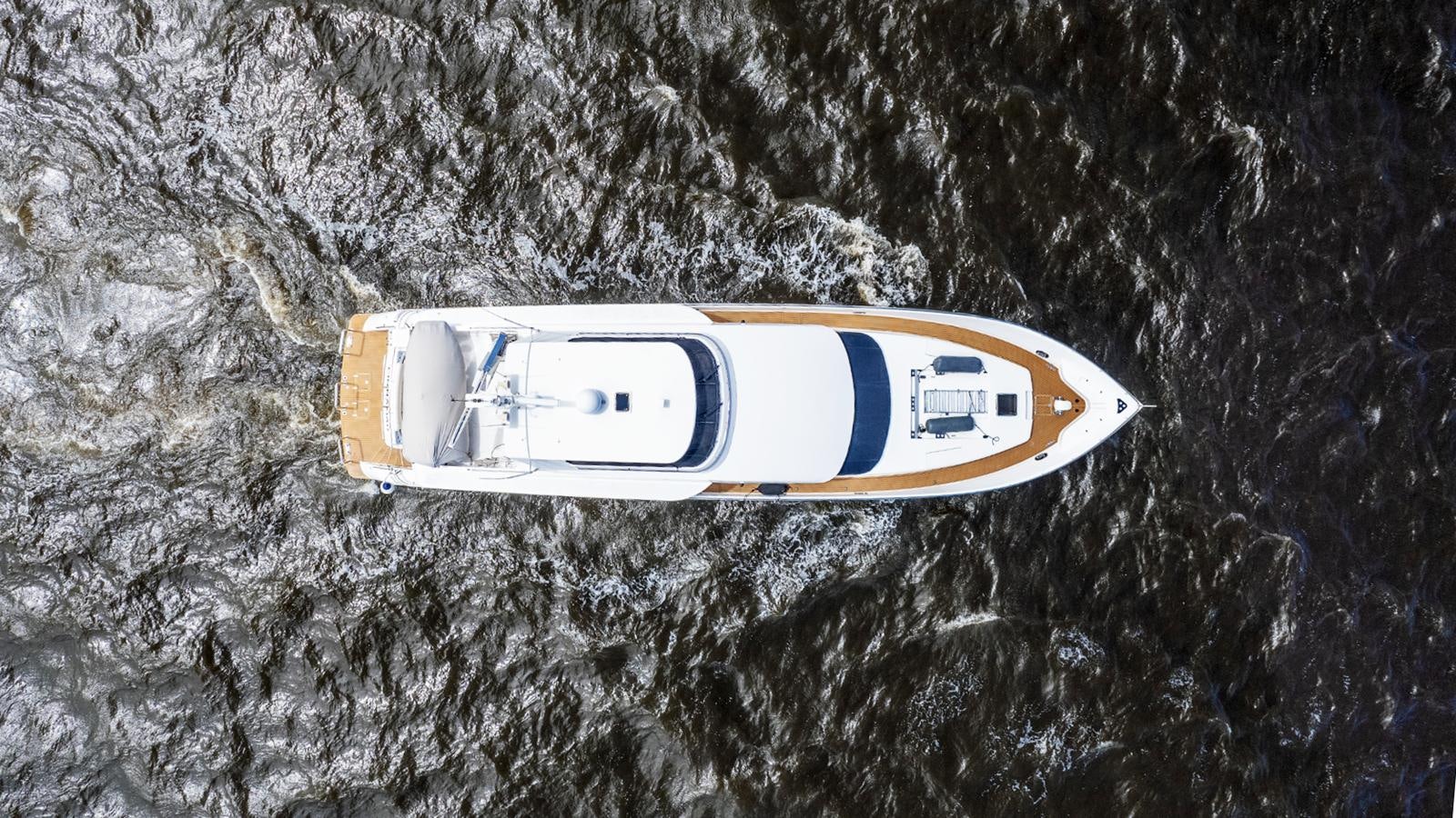 a white and blue ring on a tree aboard CINNABAR VI Yacht for Sale
