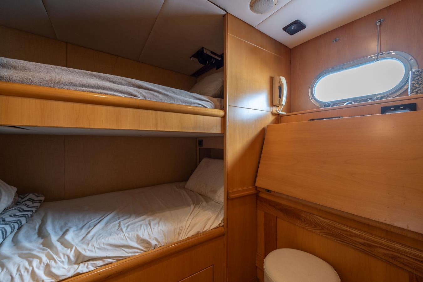 a room with bunk beds aboard CINNABAR VI Yacht for Sale