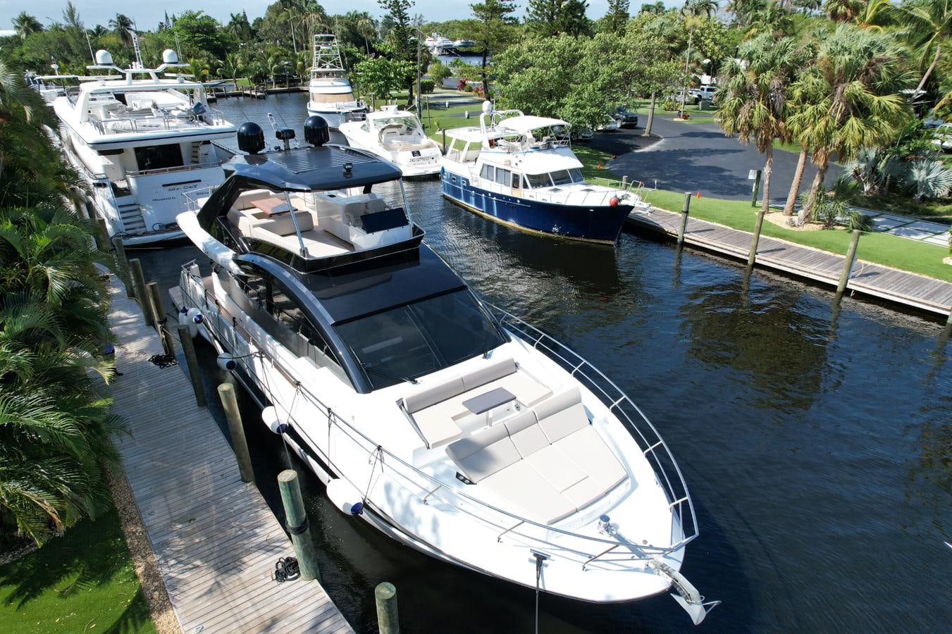 boats docked at a pier aboard 2024 ASTONDOA 66 FLYBRIDGE Yacht for Sale