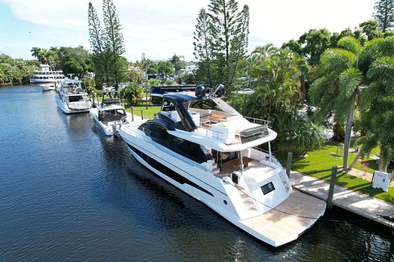 a boat docked at a pier aboard 2024 ASTONDOA 66 FLYBRIDGE Yacht for Sale