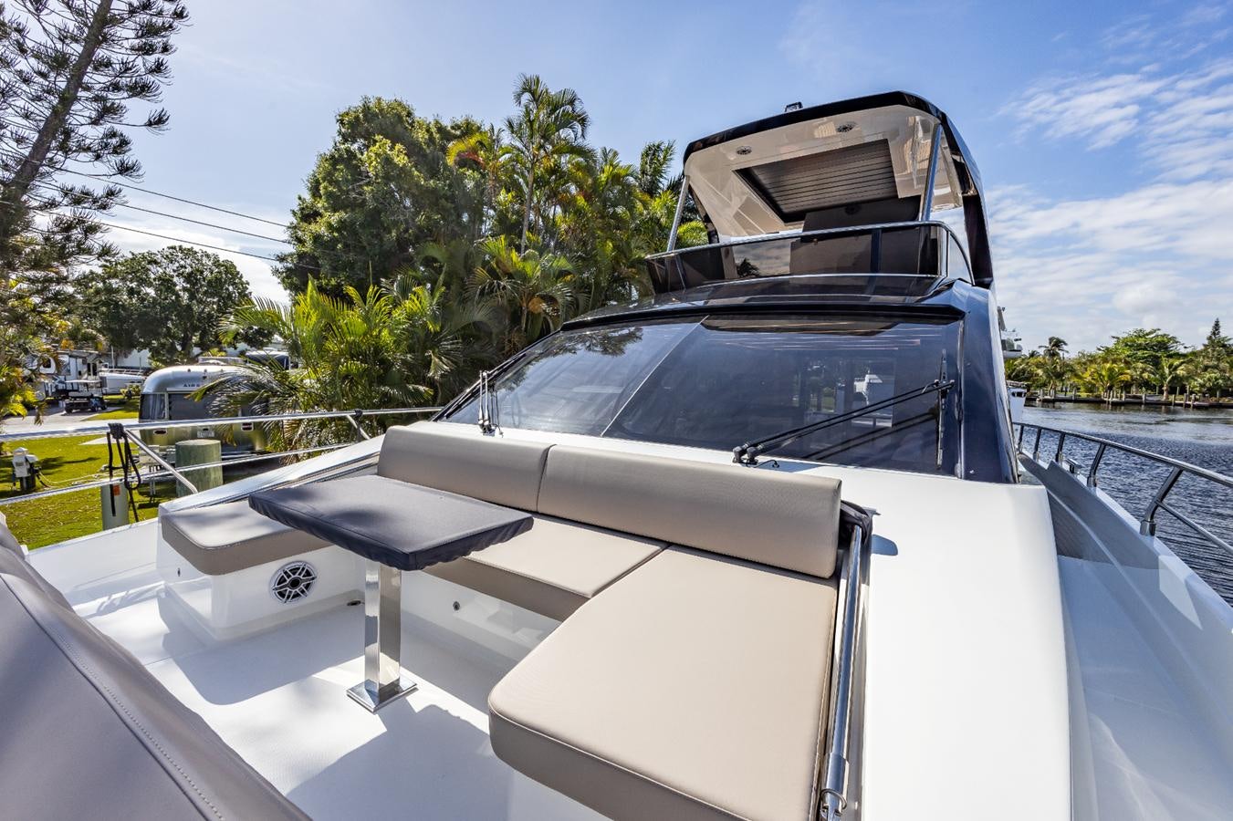 a boat with a screen on the front aboard 2024 ASTONDOA 66 FLYBRIDGE Yacht for Sale