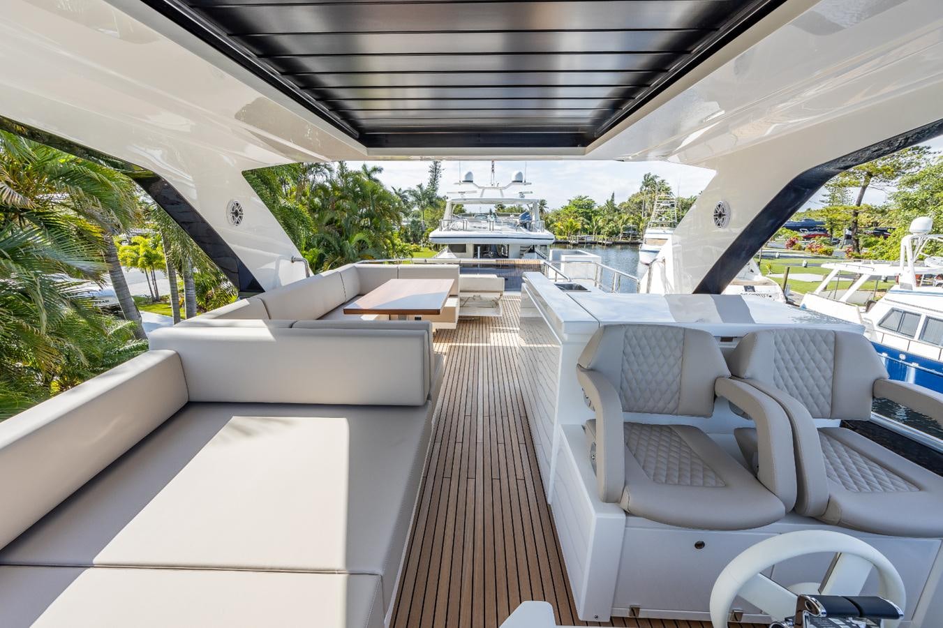 a boat on the water aboard 2024 ASTONDOA 66 FLYBRIDGE Yacht for Sale