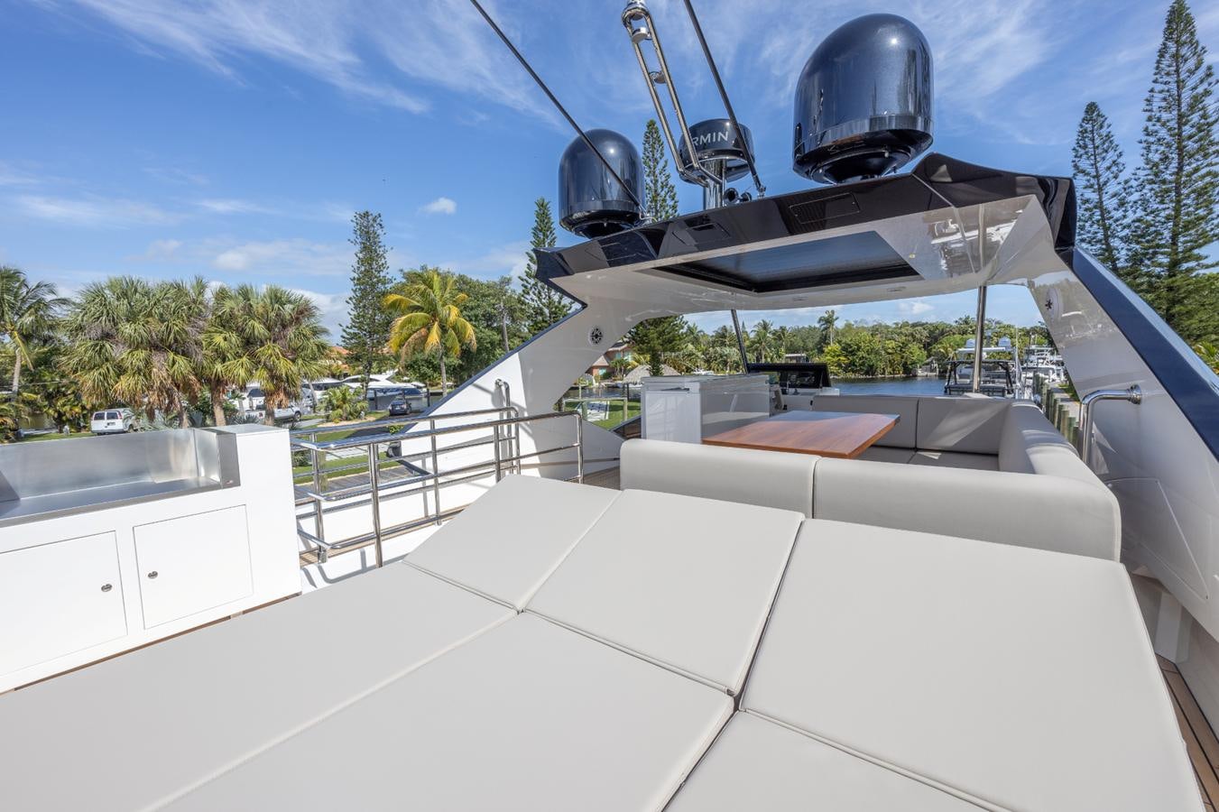 a large white boat with a satellite dish on the deck aboard 2024 ASTONDOA 66 FLYBRIDGE Yacht for Sale