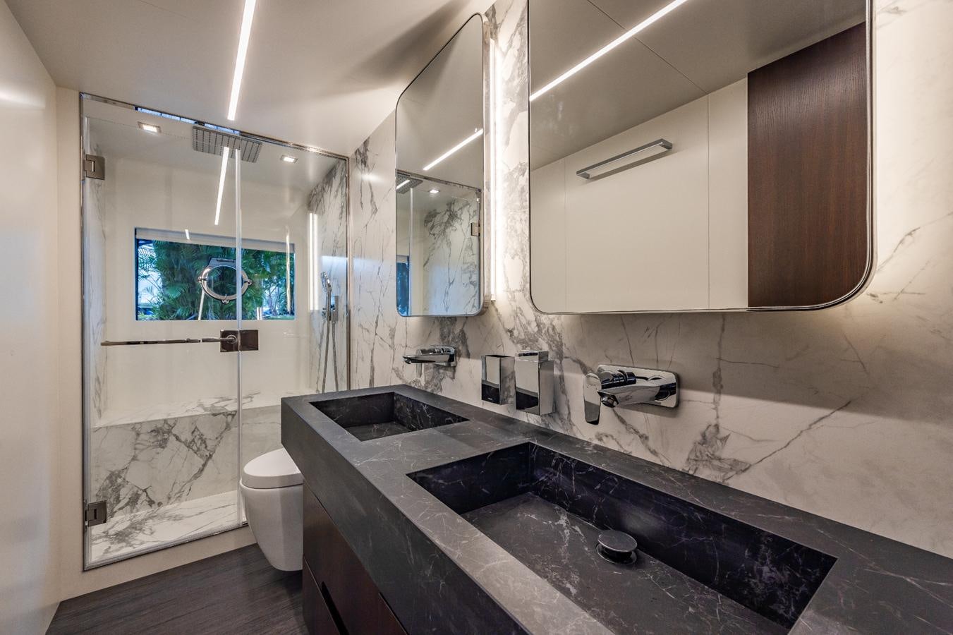a bathroom with a large marble countertop aboard 2024 ASTONDOA 66 FLYBRIDGE Yacht for Sale