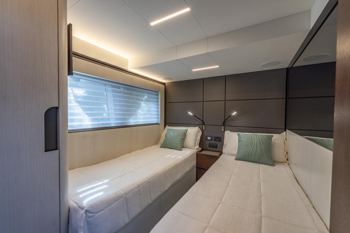 a room with two beds aboard 2024 ASTONDOA 66 FLYBRIDGE Yacht for Sale