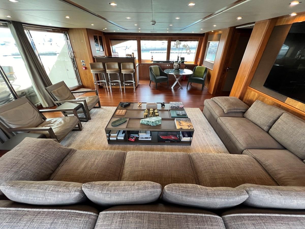 a living room with a couch and a coffee table aboard 2007 SUNSEEKER 37M Yacht for Sale