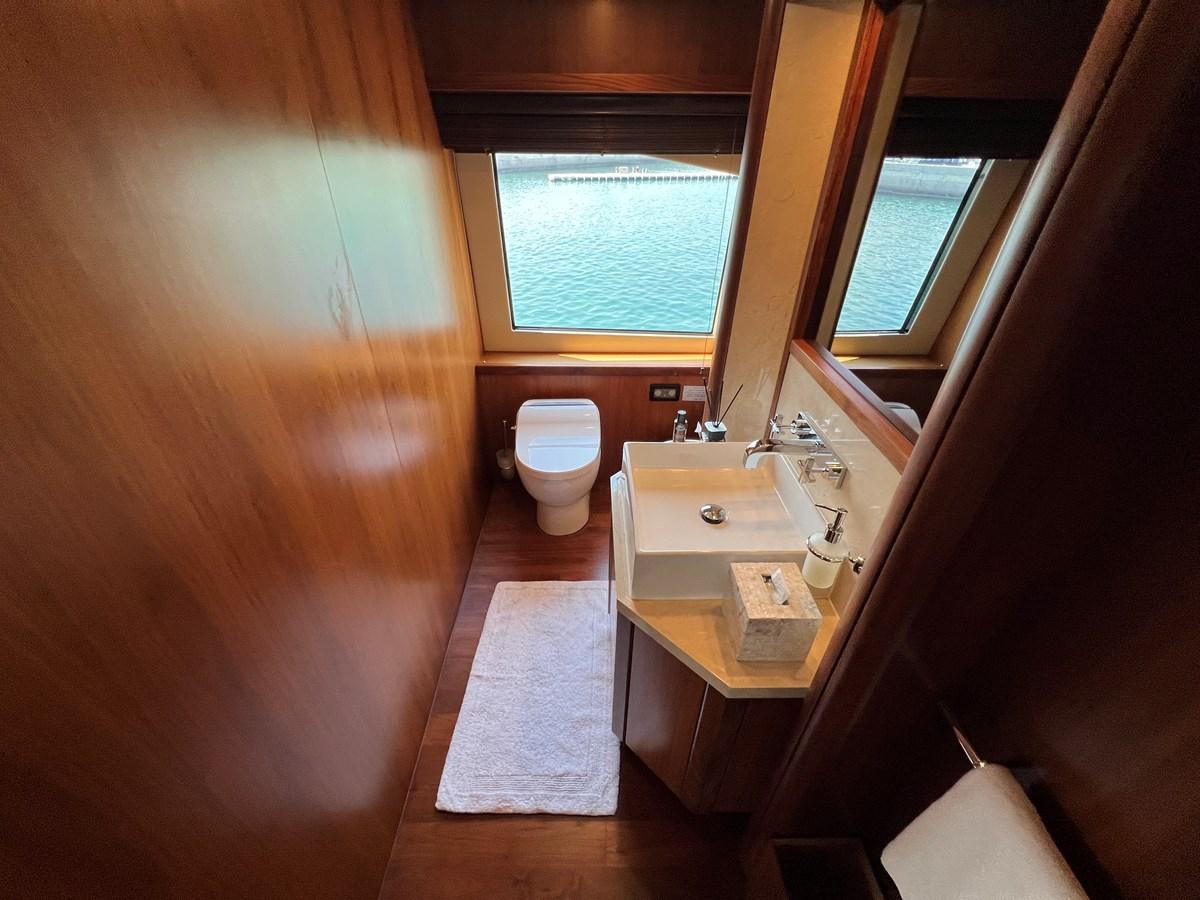 a bathroom with a sink and a toilet aboard 2007 SUNSEEKER 37M Yacht for Sale