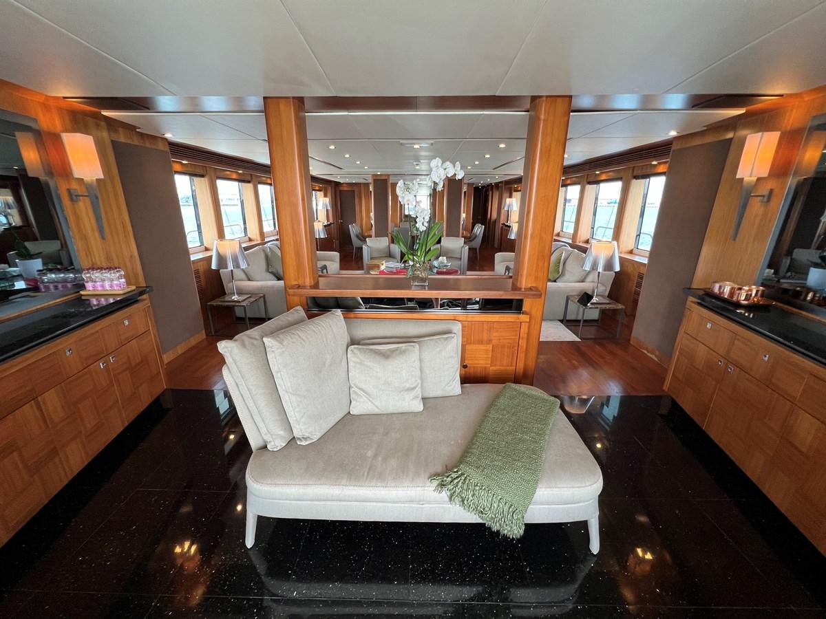a room with a couch and a table aboard 2007 SUNSEEKER 37M Yacht for Sale