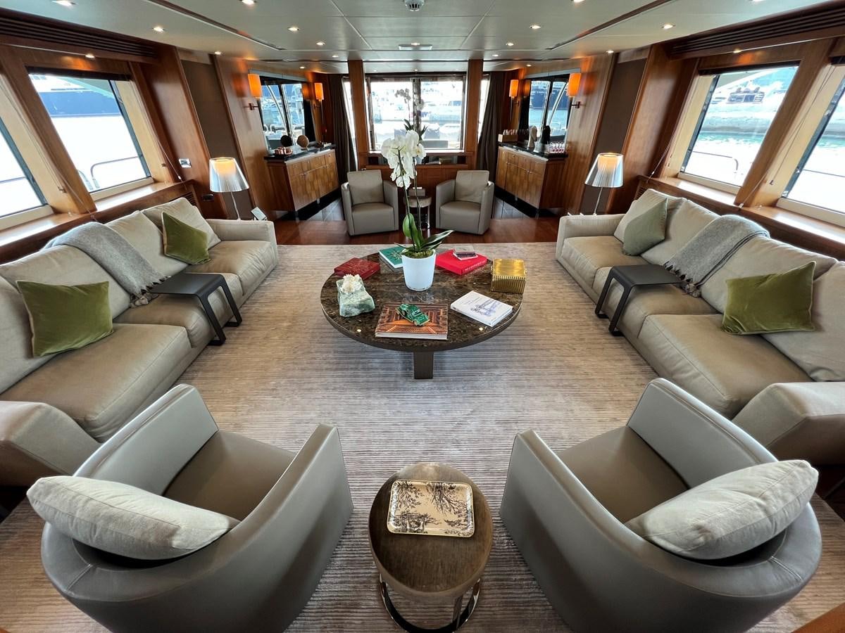 a living room with a couch and a coffee table aboard 2007 SUNSEEKER 37M Yacht for Sale