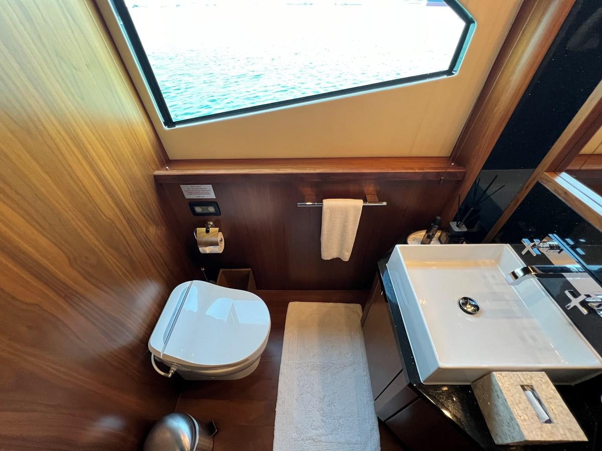 a bathroom with a sink and a toilet aboard 2007 SUNSEEKER 37M Yacht for Sale