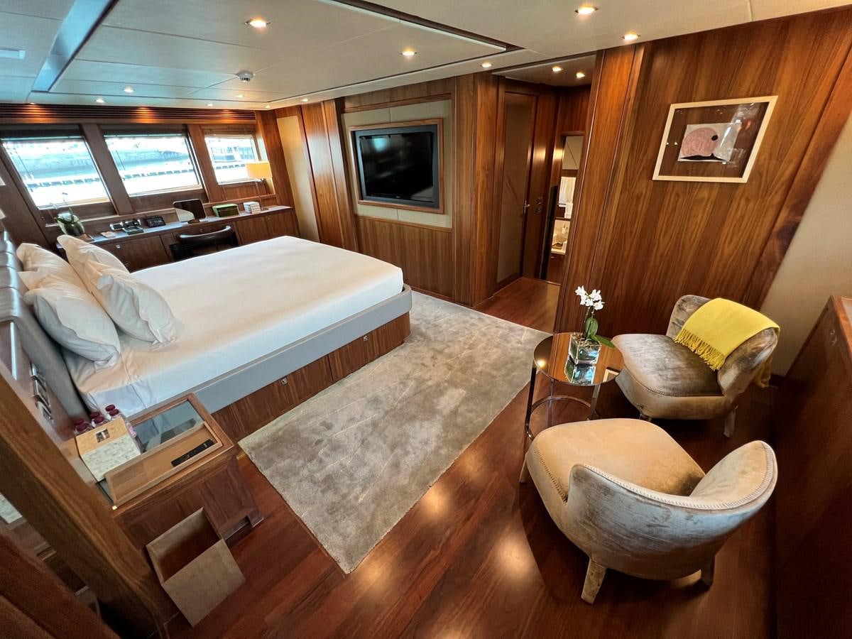 a large bedroom with a bed and a couch aboard 2007 SUNSEEKER 37M Yacht for Sale
