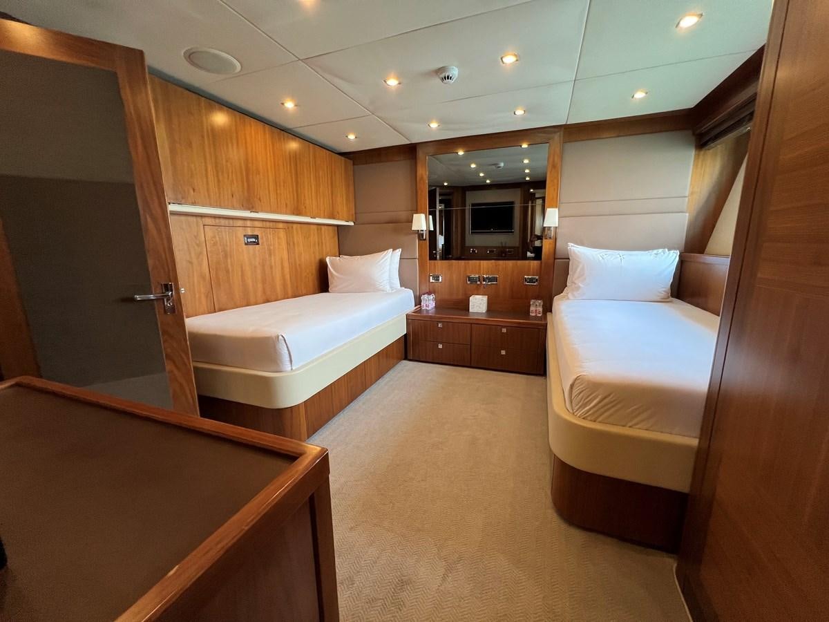 a room with a couple of beds aboard 2007 SUNSEEKER 37M Yacht for Sale