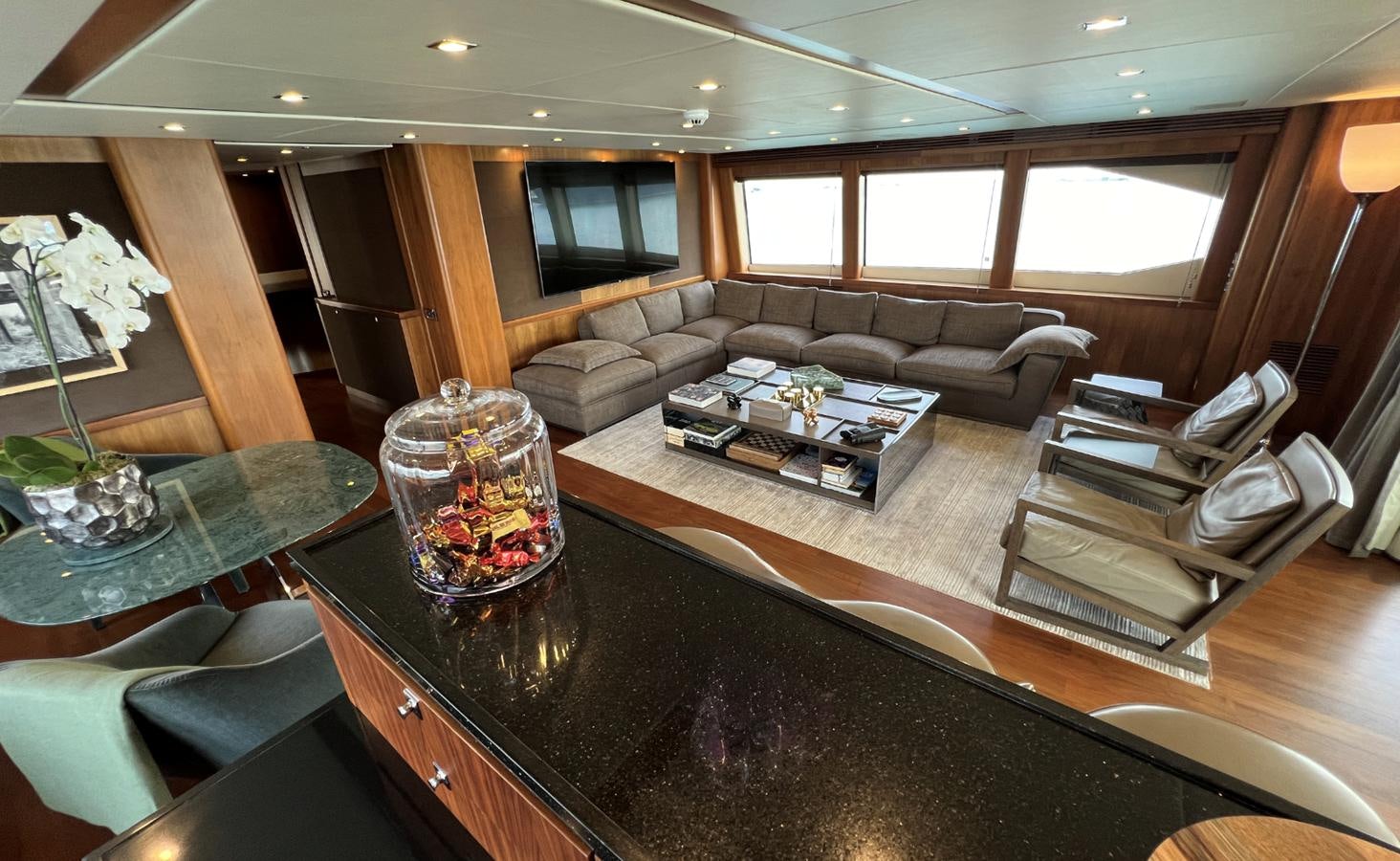 a living room with a leather couch aboard 2007 SUNSEEKER 37M Yacht for Sale
