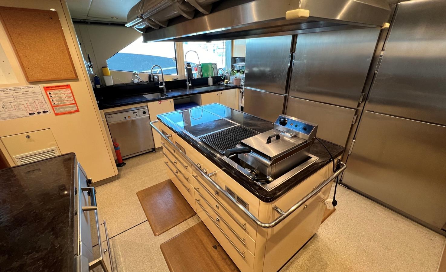 a kitchen with a stainless steel stove aboard 2007 SUNSEEKER 37M Yacht for Sale