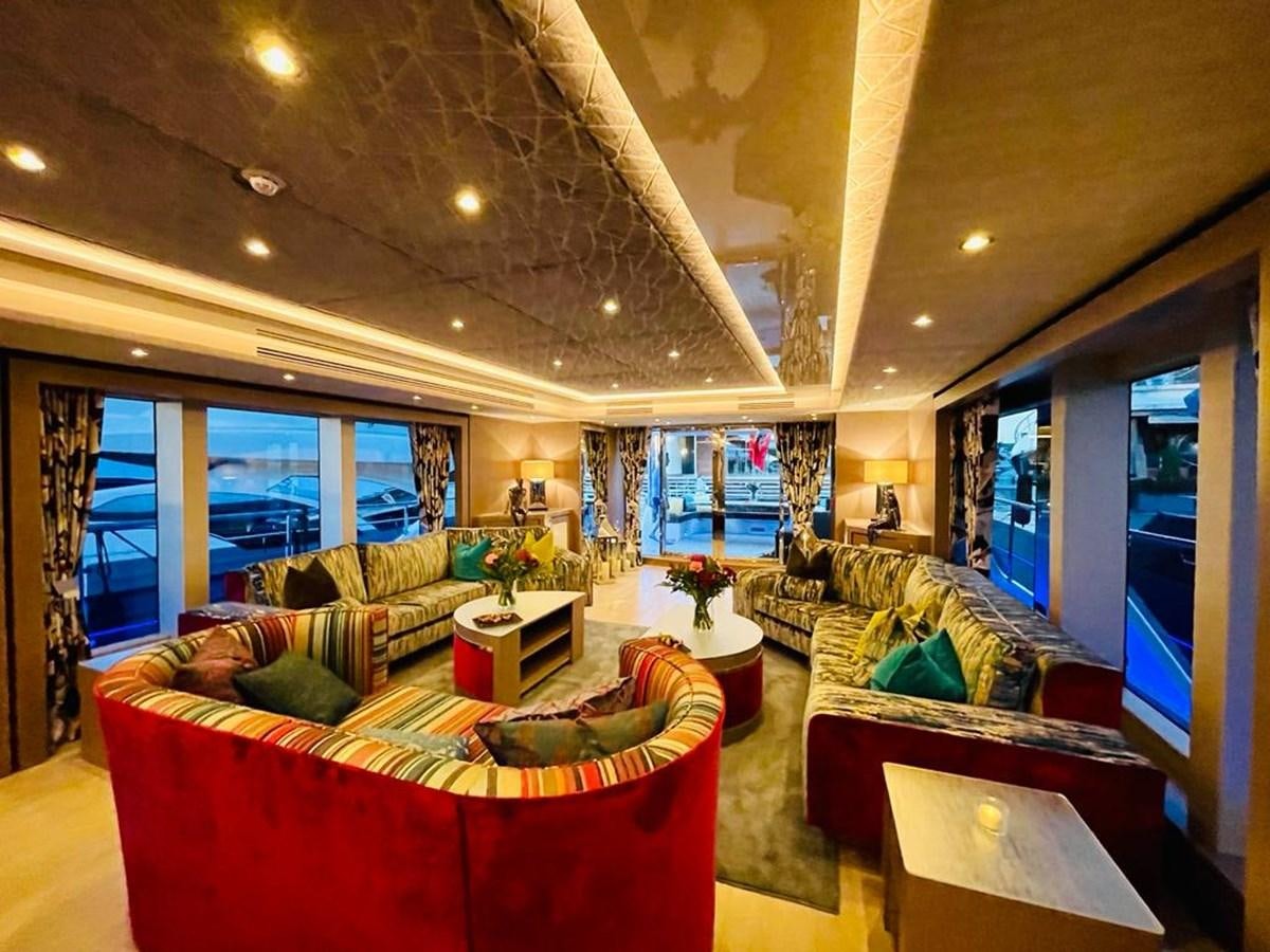 a living room with a couch and a tv aboard SKYE Yacht for Sale