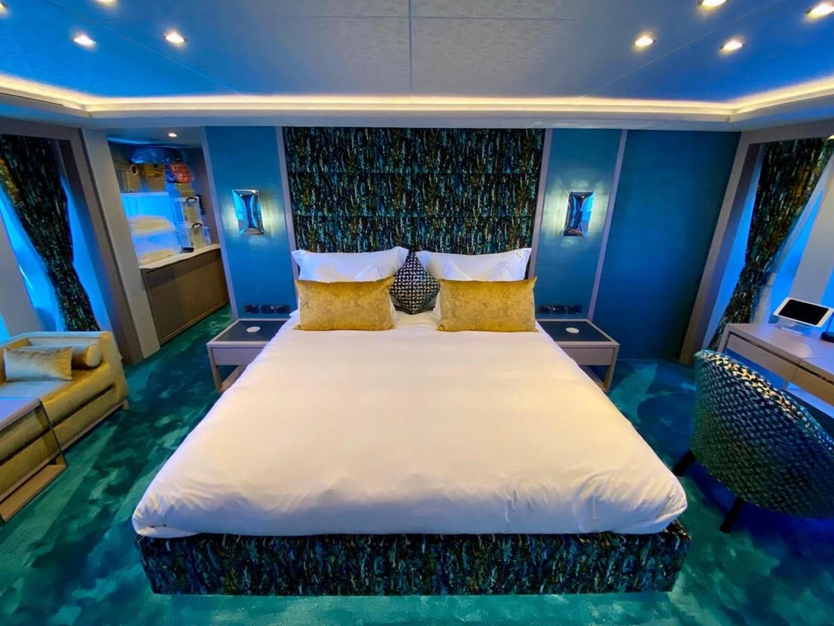 a bed in a room aboard SKYE Yacht for Sale