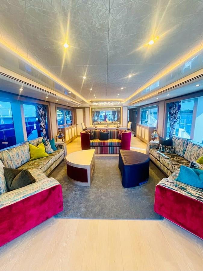 a living room with a large ceiling aboard SKYE Yacht for Sale