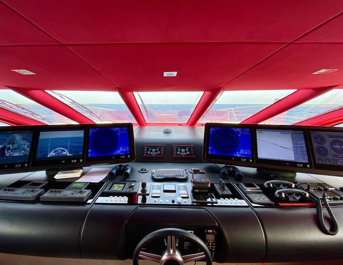 inside of a vehicle with many monitors aboard SKYE Yacht for Sale