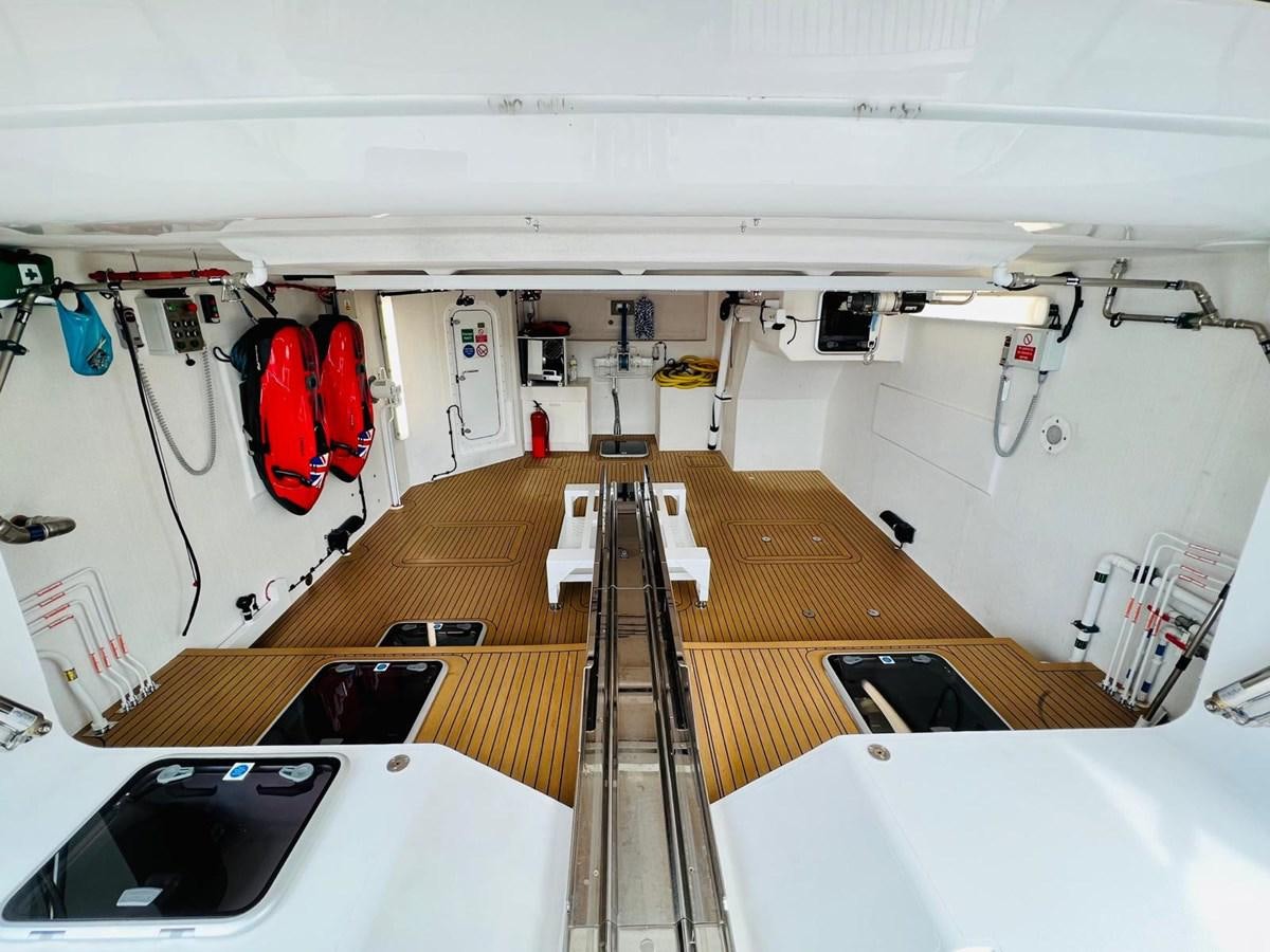 a long table with laptops on it aboard SKYE Yacht for Sale