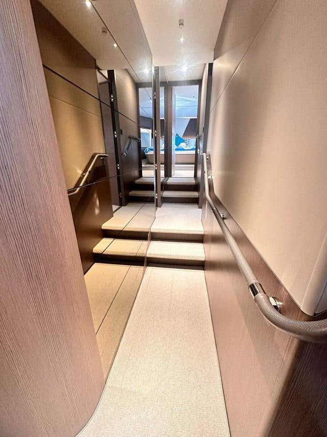 a hallway with a door and windows aboard LORP Yacht for Sale