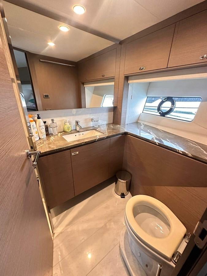 a bathroom with a sink and a toilet aboard LORP Yacht for Sale