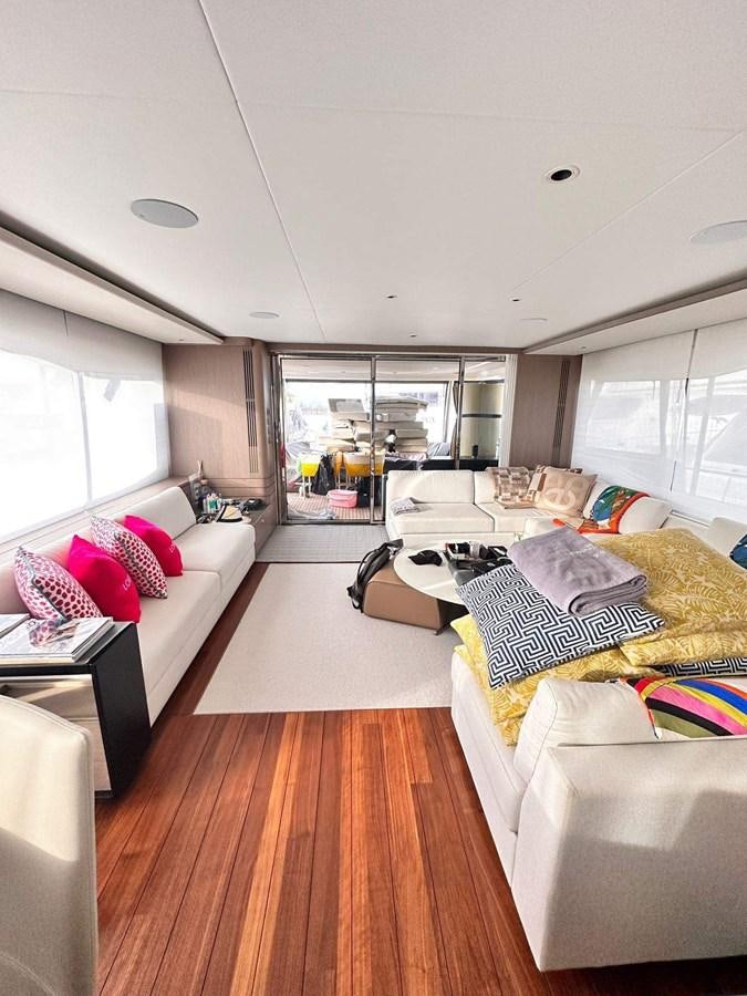a room with a bed and a table aboard LORP Yacht for Sale